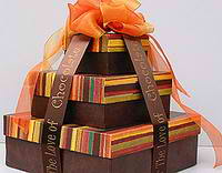 Personalized boxes tied with imprinted ribbon from Initial It Please